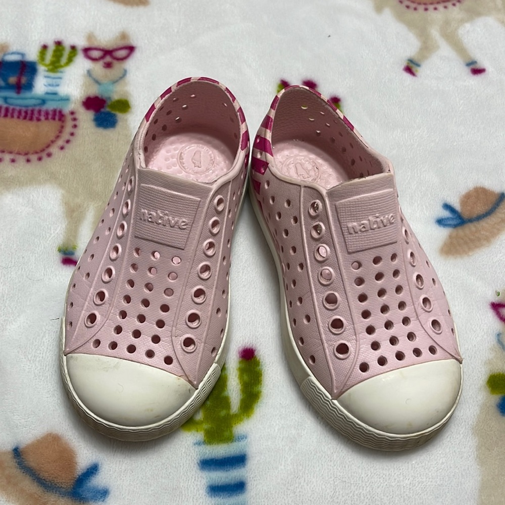Pink Native shoes in size 8.